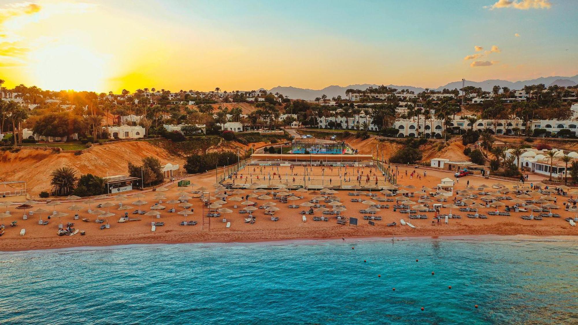 Domina Coral Bay Resort, Diving , Spa & Casino Sharm el-Sheikh Exterior photo Sunset at the beach