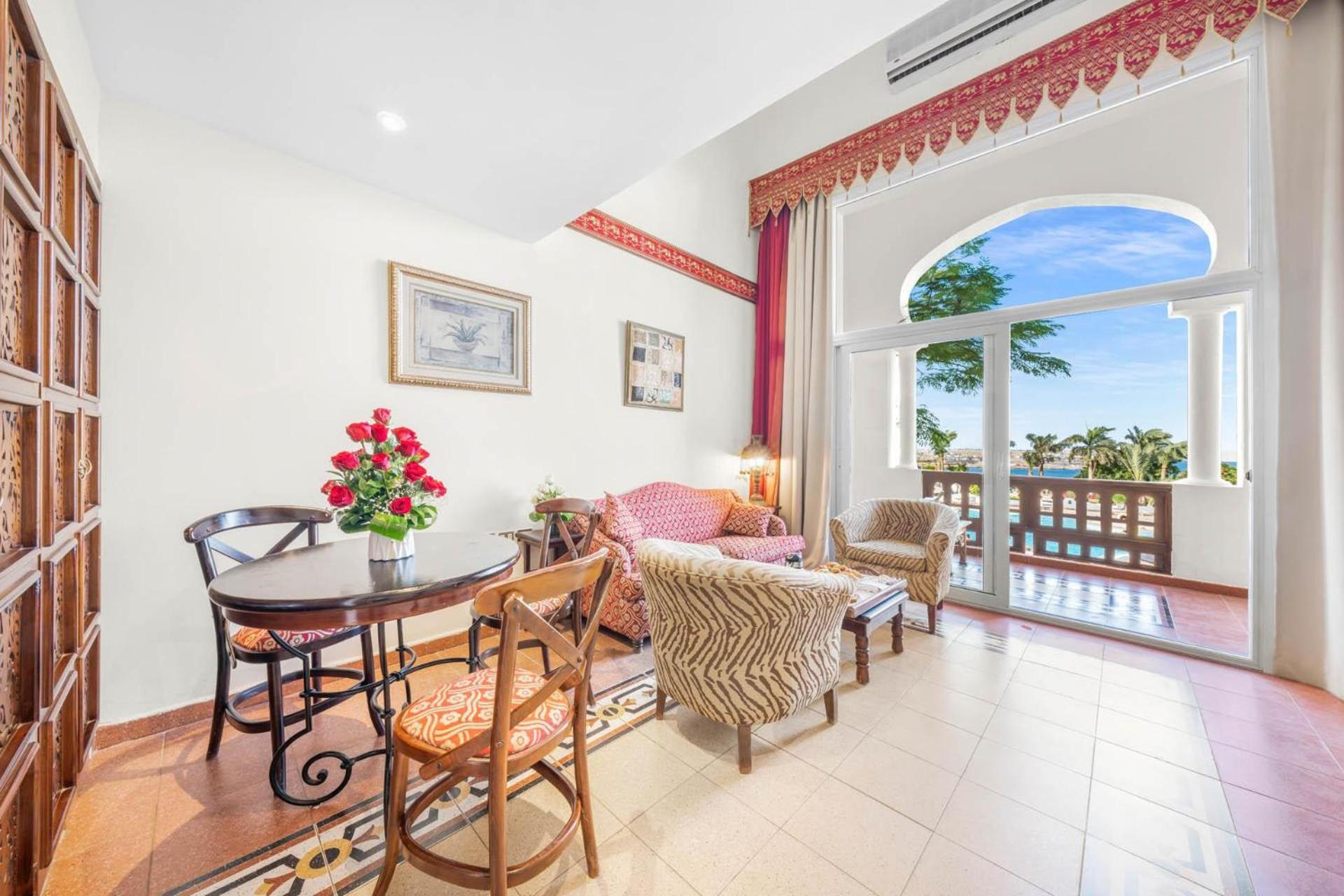 Domina Coral Bay Resort, Diving , Spa & Casino Sharm el-Sheikh Exterior photo A typical living room in a condominium